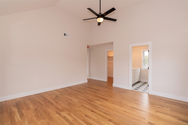 651 Vassar Rd, Poughkeepsie, NY 12603 - unfurnished room featuring baseboards, light wood-type flooring, a ceiling fan, visible vents, and high vaulted ceiling