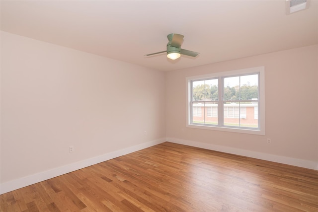 651 Vassar Rd, Poughkeepsie, NY 12603 - empty room with visible vents, light wood-type flooring, baseboards, and a ceiling fan