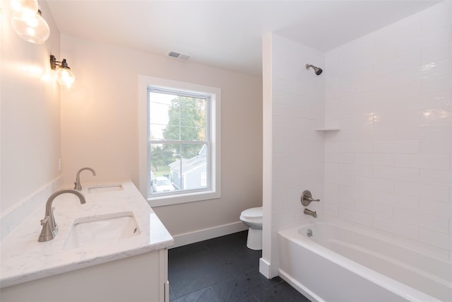 651 Vassar Rd, Poughkeepsie, NY 12603 - full bath with tile patterned flooring, shower / bathtub combination, a sink, and toilet