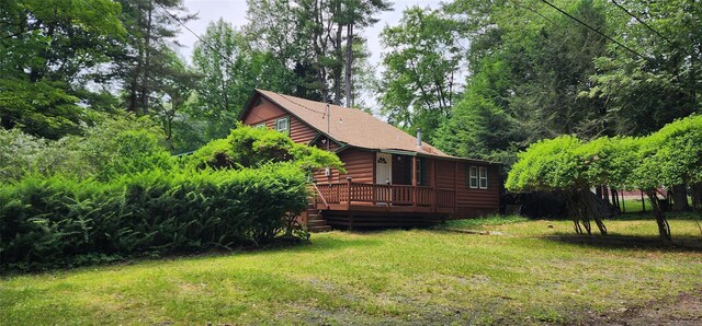 22 Ballard St, Smallwood, NY 12778 - exterior space featuring a lawn, faux log siding, and a wooden deck
