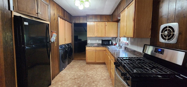 22 Ballard St, Smallwood, NY 12778 - kitchen featuring a sink, visible vents, independent washer and dryer, dark countertops, and black appliances