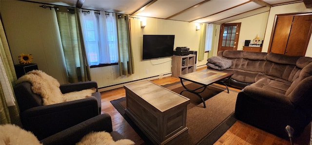 22 Ballard St, Smallwood, NY 12778 - living room featuring a baseboard radiator, vaulted ceiling, and wood finished floors
