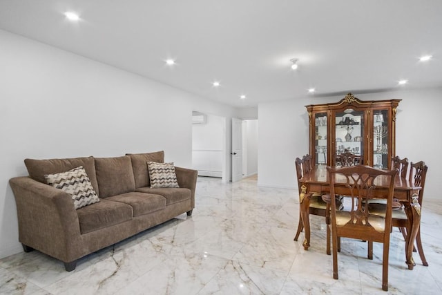 living area featuring an AC wall unit, marble finish floor, and recessed lighting