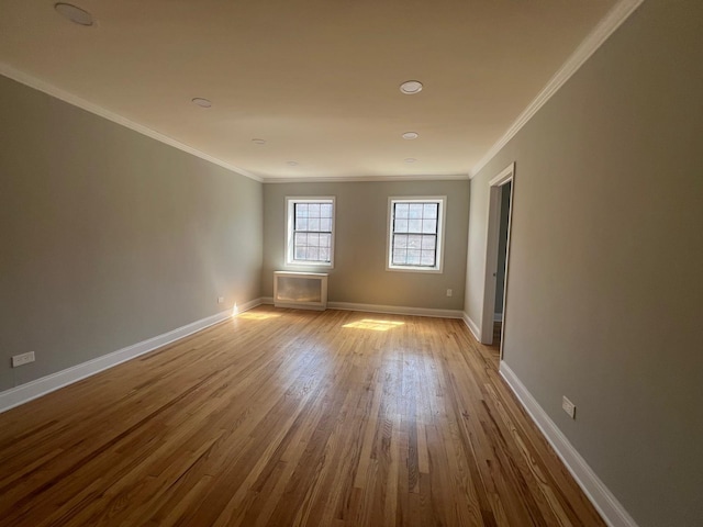 144-32 78th Ave Unit 3F, Flushing, NY 11367 - empty room featuring wood finished floors, ornamental molding, and baseboards