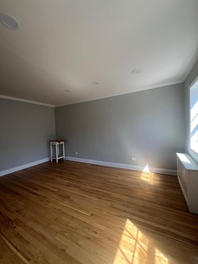144-32 78th Ave Unit 3F, Flushing, NY 11367 - unfurnished room with wood finished floors, ornamental molding, and baseboards