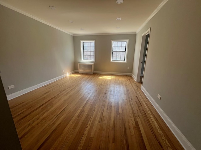 144-32 78th Ave Unit 3F, Flushing, NY 11367 - unfurnished room with wood finished floors, ornamental molding, and baseboards