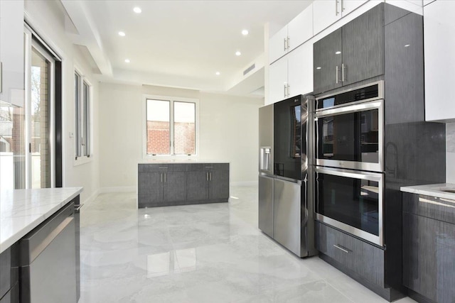 76-47 173rd St, Fresh Meadows, NY 11366 - kitchen with stainless steel appliances, recessed lighting, visible vents, and marble finish floor