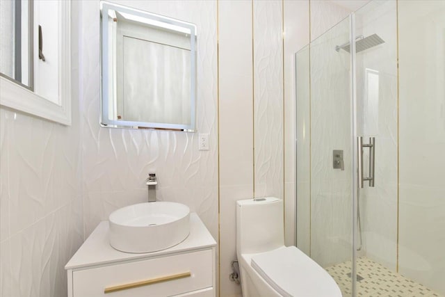 76-47 173rd St, Fresh Meadows, NY 11366 - bathroom featuring toilet, tile walls, a shower stall, and vanity