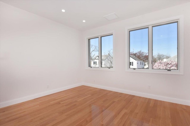 76-47 173rd St, Fresh Meadows, NY 11366 - empty room with baseboards, light wood-type flooring, and recessed lighting