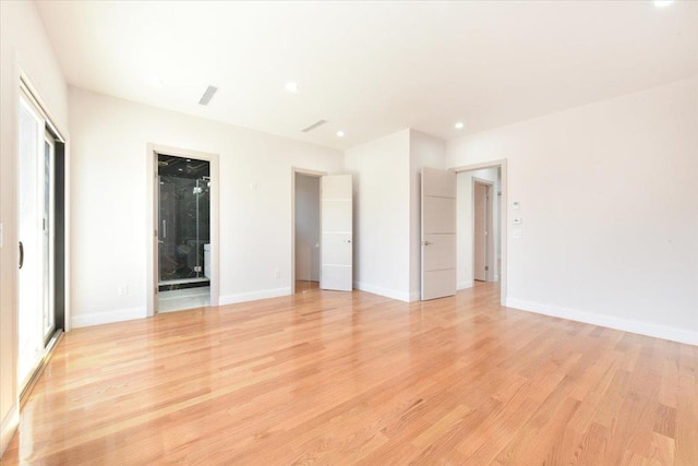 76-47 173rd St, Fresh Meadows, NY 11366 - unfurnished bedroom featuring light wood-style floors, ensuite bathroom, baseboards, and recessed lighting