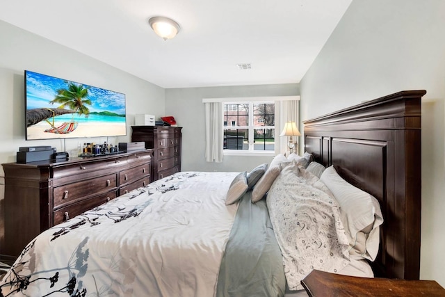 bedroom featuring visible vents