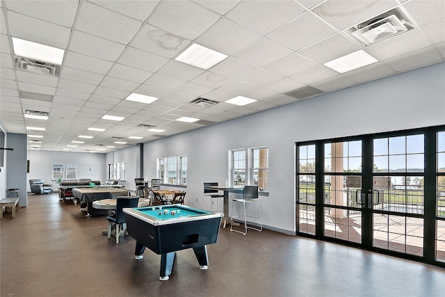 rec room with visible vents, a paneled ceiling, pool table, and a healthy amount of sunlight