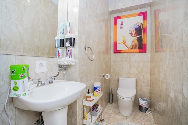 2314 National Dr, Brooklyn, NY 11234 - bathroom with tile patterned flooring, toilet, and tile walls