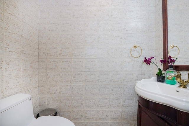 2314 National Dr, Brooklyn, NY 11234 - half bath with tile walls, toilet, and vanity