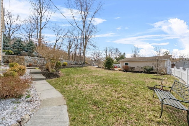 view of yard featuring fence
