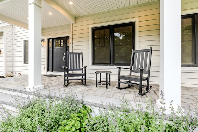 doorway to property featuring a porch