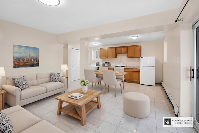 54-30 Kissena Blvd, Flushing, NY 11355 - living area featuring a baseboard radiator and light tile patterned floors