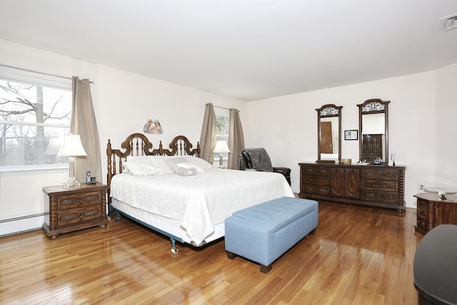 106 Key Pl, Orangeburg, NY 10962 - bedroom featuring wood-type flooring, visible vents, and multiple windows