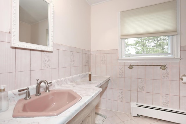 106 Key Pl, Orangeburg, NY 10962 - bathroom with tile patterned floors, tile walls, a baseboard heating unit, and vanity