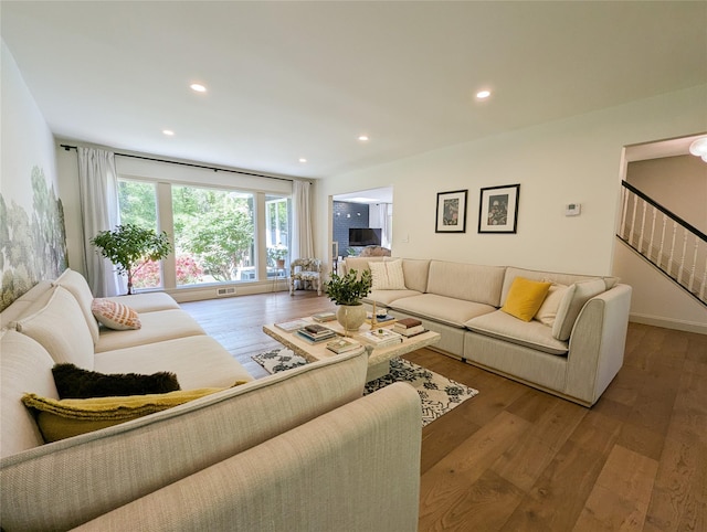 1 Concord Dr, Fort Salonga, NY 11768 - living room with hardwood / wood-style floors, stairway, and recessed lighting