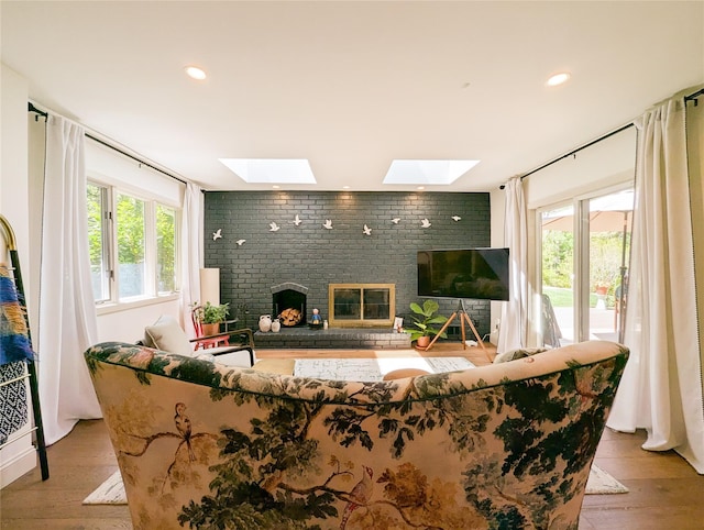 1 Concord Dr, Fort Salonga, NY 11768 - living room with a skylight, a fireplace, hardwood / wood-style flooring, and recessed lighting