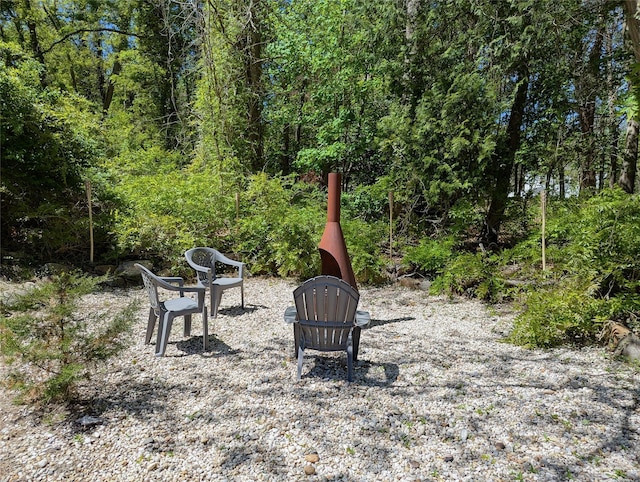 1 Concord Dr, Fort Salonga, NY 11768 - view of yard featuring a wooded view