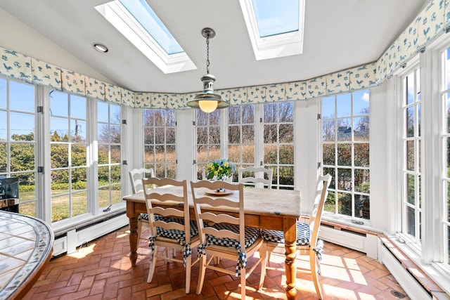 3 Wincoma Dr, Huntington Bay, NY 11743 - sunroom with a baseboard radiator, brick floor, vaulted ceiling with skylight, and recessed lighting