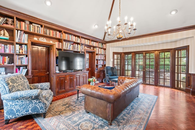 3 Wincoma Dr, Huntington Bay, NY 11743 - living room with built in features, vaulted ceiling, crown molding, and a chandelier