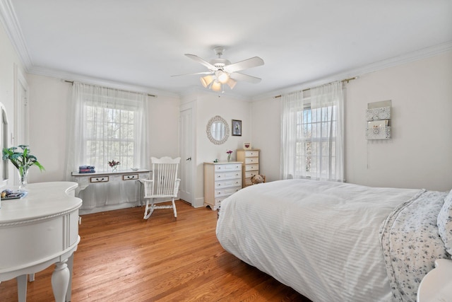 3 Wincoma Dr, Huntington Bay, NY 11743 - bedroom featuring crown molding, light wood-style flooring, and ceiling fan