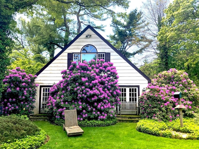 3 Wincoma Dr, Huntington Bay, NY 11743 - exterior space with a lawn and french doors