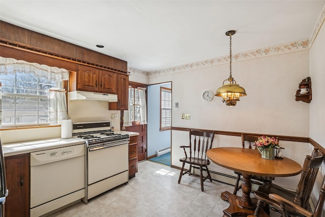 kitchen featuring wallpapered walls, white appliances, light countertops, under cabinet range hood, and a baseboard radiator