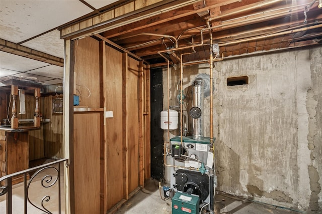 unfinished below grade area featuring a heating unit