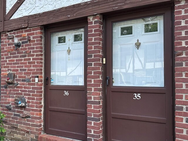 35 Bailey Ct Unit 35, Middle Island, NY 11953 - entrance to property featuring brick siding