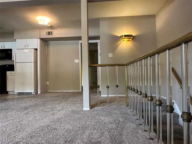 35 Bailey Ct Unit 35, Middle Island, NY 11953 - interior space with carpet and baseboards