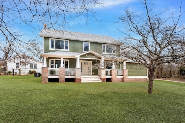 view of front of property with a chimney, covered porch, and roof with shingles