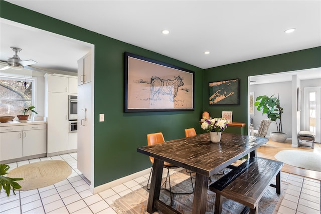 dining room featuring light tile patterned floors, plenty of natural light, ceiling fan, recessed lighting, and baseboards