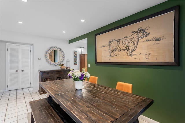 dining space with light tile patterned floors, recessed lighting, and baseboards