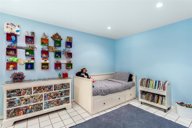 tiled bedroom with recessed lighting and baseboards
