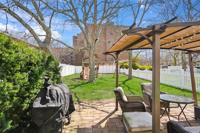 view of patio / terrace featuring a pergola and a fenced backyard