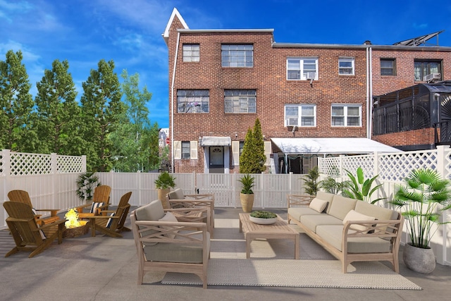 1774 Pitman Ave, Bronx, NY 10466 - view of patio with an outdoor living space with a fire pit and fence