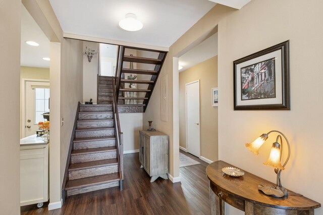 29 Fairway Pl Unit 14, Montauk, NY 11954 - stairway with wood finished floors and baseboards
