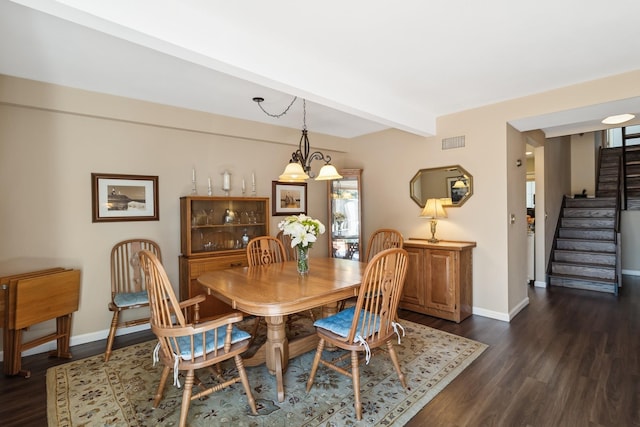 29 Fairway Pl Unit 14, Montauk, NY 11954 - dining space with visible vents, stairway, beamed ceiling, dark wood-style floors, and baseboards
