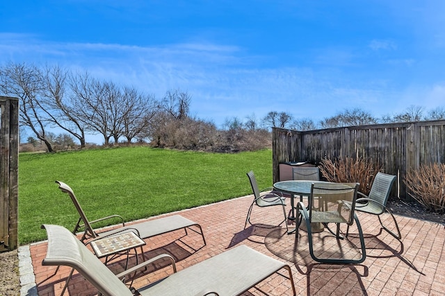 29 Fairway Pl Unit 14, Montauk, NY 11954 - view of patio / terrace with fence and outdoor dining space