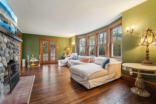 12 Sunset View Dr, West Nyack, NY 10994 - living room featuring french doors, a stone fireplace, and hardwood / wood-style floors