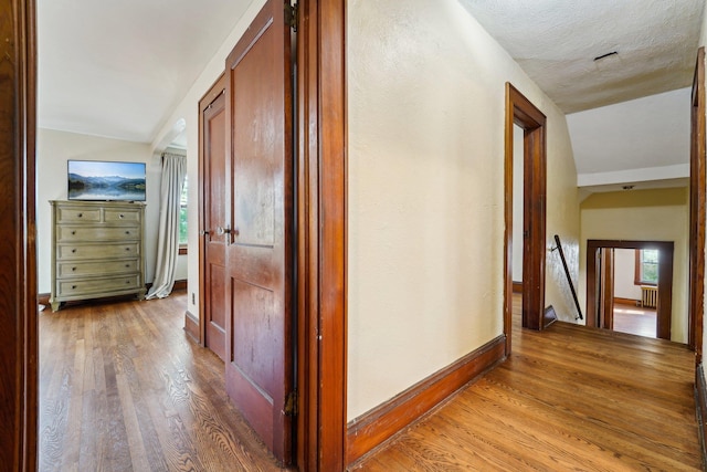 12 Sunset View Dr, West Nyack, NY 10994 - hall featuring a wealth of natural light, an upstairs landing, light wood-style flooring, and baseboards