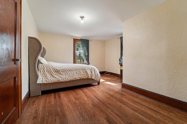 12 Sunset View Dr, West Nyack, NY 10994 - bedroom featuring wood finished floors, a textured wall, and baseboards