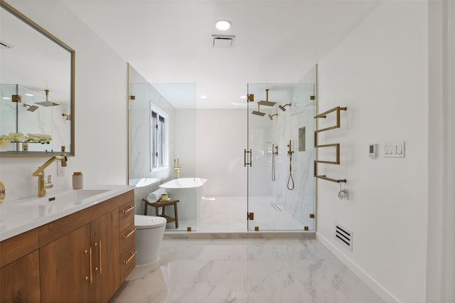 bathroom featuring a freestanding bath, visible vents, marble finish floor, and a marble finish shower