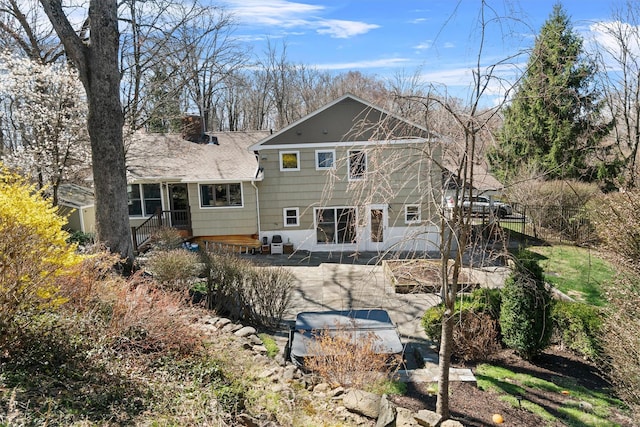 21 Glengary Rd, Croton-On-Hudson, NY 10520 - back of house with a patio area and a chimney