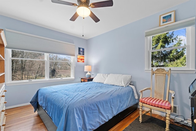21 Glengary Rd, Croton-On-Hudson, NY 10520 - bedroom featuring multiple windows, baseboards, a ceiling fan, and wood finished floors