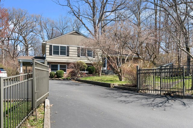 21 Glengary Rd, Croton-On-Hudson, NY 10520 - exterior space featuring aphalt driveway and a gated entry